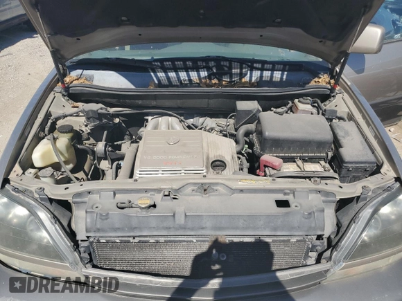 1999 Lexus RX 300 z VIN JT6GF10U7X0036274, wystawiony jako Copart lot #57787864 z przebiegiem 211 369 mil mil oraz Szkoda całkowita • Salvage title. Historia ofert i sprzedaży dostępna na DreamBid. Obrazek 12.
