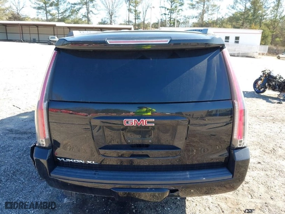 2017 GMC Yukon XL SLT with VIN 1GKS1GKC3HR351129, listed as a IAAI auction lot 41602465 with NaN miles. Bid and sale history available at carsss.com. Image 15.