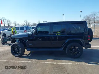 2021 Jeep Wrangler Unlimited Sahara with VIN 1C4JJXP62MW826470, listed as a IAAI auction lot 41651709 with 44,677 mi miles and . Bid and sale history available at carsss.com. Image 14.