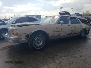 1982 Chevrolet Caprice z VIN 2G1AN35HXC1237392, wystawiony jako Copart lot #69453243 z przebiegiem 31 492 mil mil oraz Szkoda całkowita • Salvage title. Historia ofert i sprzedaży dostępna na DreamBid. Obrazek 1.