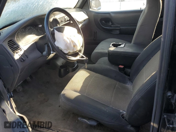 2002 Ford Ranger with VIN 1FTZR15U52PA08409, listed as a Copart auction lot 87858015 with 128,892 mi miles and Salvage Title. Bid and sale history available at DreamBid. Image 7.