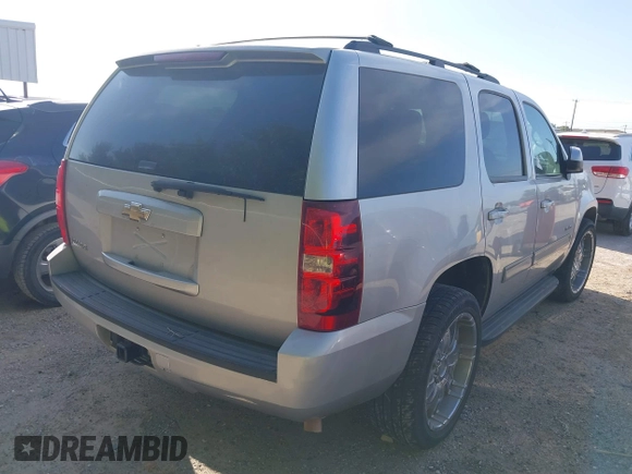 2011 Chevrolet Tahoe LS with VIN 1GNSCAE00BR140716, listed as a IAAI auction lot 40225018 with 189,052 mi miles and . Bid and sale history available at DreamBid. Image 4.