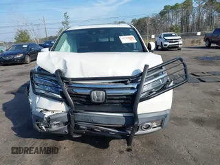 2018 Honda Ridgeline RTL-E with VIN 5FPYK3F71JB001753, listed as a IAAI auction lot 41510248 with 84,551 mi miles and . Bid and sale history available at DreamBid. Image 12.