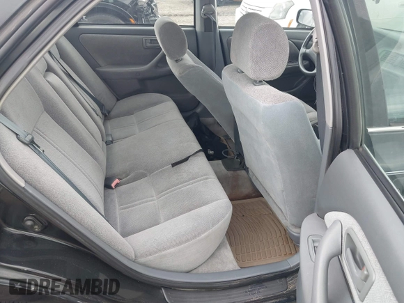 2001 Toyota Camry CE z VIN 4T1BG22K81U054795, wystawiony jako IAAI lot #42359932 z przebiegiem 167 341 mil mil oraz . Historia ofert i sprzedaży dostępna na DreamBid. Obrazek 8.
