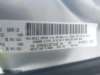 2011 Dodge Grand Caravan Mainstreet with VIN 2D4RN3DG1BR774285, listed as a IAAI auction lot 41668048 with 157,662 mi miles. Bid and sale history available at carsss.com. Image 9.