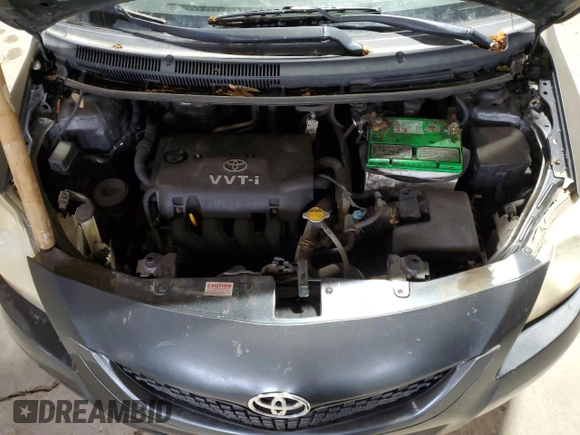 2009 Toyota Yaris z VIN JTDBT903391318992, wystawiony jako Copart lot #58753615 z przebiegiem 286 924 mil mil oraz Tytuł czysty. Historia ofert i sprzedaży dostępna na DreamBid. Obrazek 11.