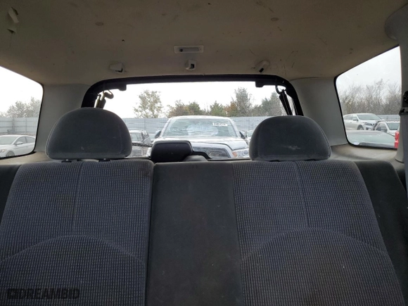 2003 Mazda Tribute LX with VIN 4F2YZ04173KM39426, listed as a Copart auction lot 82664104 with 0 mi miles and Salvage Title. Bid and sale history available at carsss.com. Image 10.