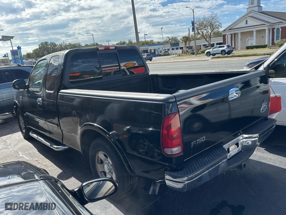 1999 Ford F-150 Work Series with VIN 1FTRX17W5XNC03174, listed as a Copart auction lot 87051864 with 210,577 mi miles and Clean Title. Bid and sale history available at carsss.com. Image 3.