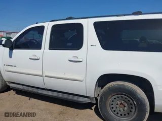 2009 GMC Yukon XL SLT w/4SB with VIN 1GKFC36J49R210309, listed as a IAAI auction lot 42025315 with 236,004 mi miles. Bid and sale history available at carsss.com. Image 14.