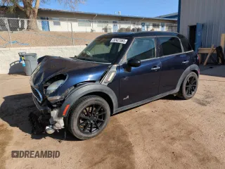 2012 MINI Countryman S with VIN WMWZC5C50CWL63321, listed as a Copart auction lot 52427065 with 126,898 mi miles and Salvage Title. Bid and sale history available at DreamBid. Image 1.