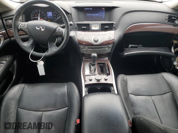 2016 Infiniti Q70 z VIN JN1BY1PP9GM631376, wystawiony jako Copart lot #89205375 z przebiegiem 100 433 mil mil oraz Szkoda całkowita • Salvage title. Historia ofert i sprzedaży dostępna na DreamBid. Obrazek 8.