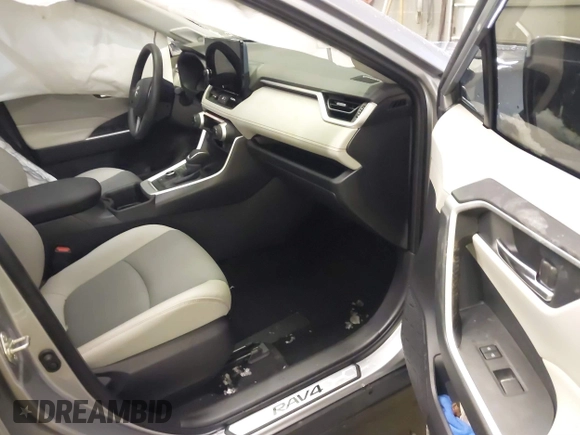 2024 Toyota RAV4 Hybrid XLE Premium with VIN JTMB6RFV5RD148973, listed as a IAAI auction lot 41516422 with 8,797 mi miles. Bid and sale history available at carsss.com. Image 5.