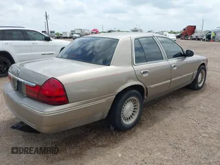 2004 Mercury Grand Marquis GS with VIN 2MEFM74W94X671873, listed as a IAAI auction lot 42130841 with 92,757 mi miles and . Bid and sale history available at DreamBid. Image 4.