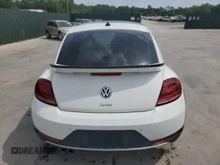 2017 Volkswagen Beetle Dune с VIN 3VWS17AT4HM628723, выставлен на аукционе Copart как лот 54303445 с пробегом 138 254 миль миль и Списание • Salvage title. История ставок и продаж доступна на DreamBid. Изображение 6.