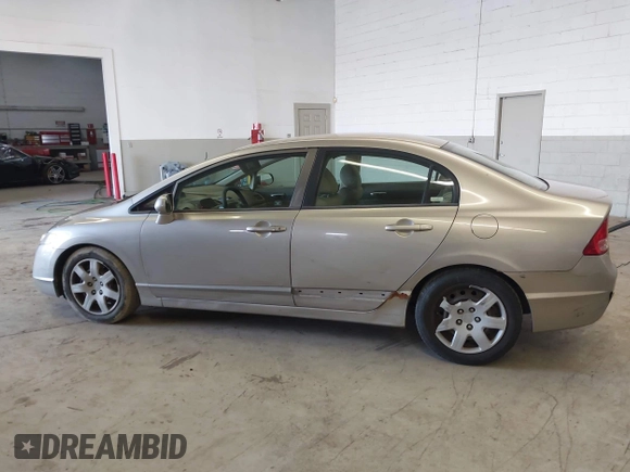 2006 Honda Civic LX z VIN 1HGFA16556L005459, wystawiony jako IAAI lot #41940768 z przebiegiem 178 595 mil mil oraz . Historia ofert i sprzedaży dostępna na DreamBid. Obrazek 14.