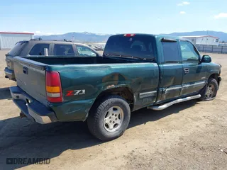 2002 Chevrolet Silverado 1500 LT with VIN 2GCEK19T821314733, listed as a IAAI auction lot 42057566 with 244,783 mi miles. Bid and sale history available at carsss.com. Image 4.