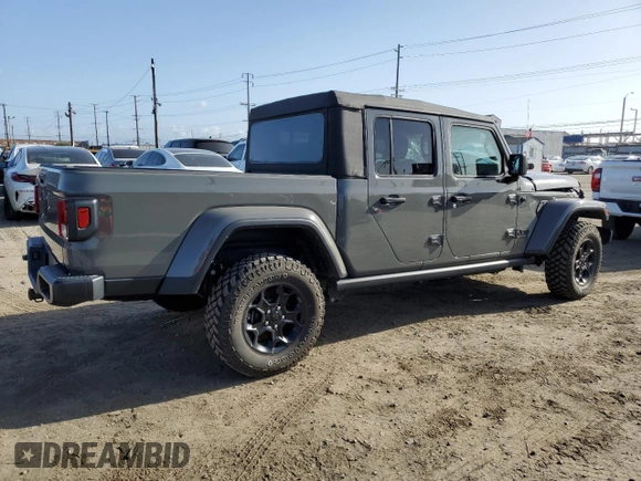 2023 Jeep Gladiator Willys z VIN 1C6HJTAG0PL561098, wystawiony jako Copart lot #51646485 z przebiegiem 20 554 mil mil oraz Szkoda całkowita • Salvage title. Historia ofert i sprzedaży dostępna na DreamBid. Obrazek 3.