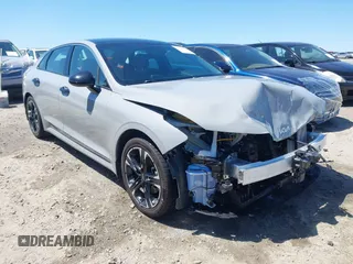 2024 Kia K5 GT-Line z VIN 5XXG64J28RG259514, wystawiony jako IAAI lot #42045439 z przebiegiem 28 835 mil mil oraz . Historia ofert i sprzedaży dostępna na DreamBid. Obrazek 1.