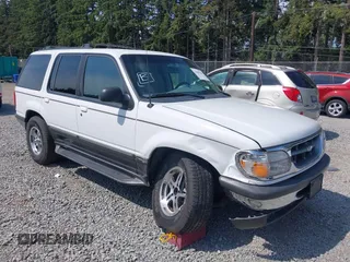 1998 Ford Explorer XL z VIN 1FMZU34E3WZA90831, wystawiony jako IAAI lot #42500120 z przebiegiem 97 799 mil mil oraz . Historia ofert i sprzedaży dostępna na DreamBid. Obrazek 1.