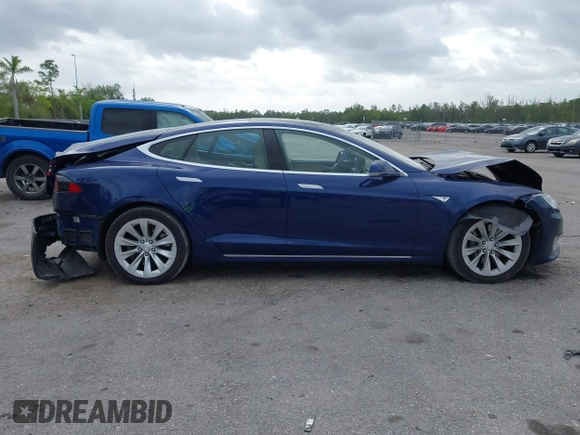 2016 Tesla Model S 70 with VIN 5YJSA1E10GF141725, listed as a IAAI auction lot 41878171 with 119,025 mi miles and . Bid and sale history available at DreamBid. Image 13.