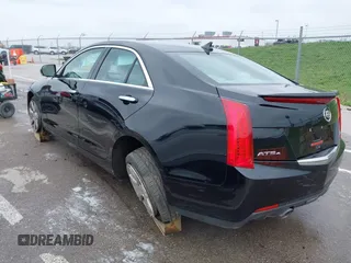 2014 Cadillac ATS Luxury AWD z VIN 1G6AH5SX0E0196052, wystawiony jako IAAI lot #41995886 z przebiegiem 97 531 mil mil oraz . Historia ofert i sprzedaży dostępna na DreamBid. Obrazek 3.