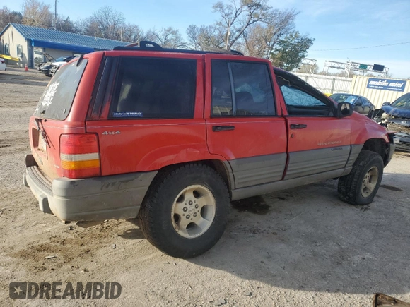 1998 Jeep Grand Cherokee Laredo with VIN 1J4GZ58S7WC105854, listed as a Copart auction lot 82321254 with 178,072 mi miles and Salvage Title. Bid and sale history available at carsss.com. Image 3.