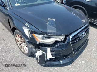 2015 Audi A6 Premium Plus z VIN WAUGFAFC0FN026501, wystawiony jako IAAI lot #40129539 z przebiegiem 48 269 mil mil oraz . Historia ofert i sprzedaży dostępna na DreamBid. Obrazek 6.