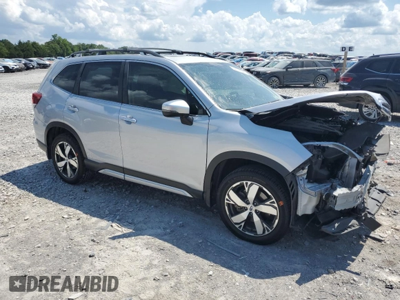 2021 Subaru Forester Touring with VIN JF2SKAXCXMH458971, listed as a Copart auction lot 64107045 with 59,672 mi miles and Salvage title. Bid and sale history available at DreamBid. Image 4.