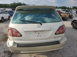 2000 Lexus RX 300 with VIN JT6HF10U9Y0138004, listed as a Copart auction lot 69273974 with 0 mi miles and Salvage Title. Bid and sale history available at carsss.com. Image 6.