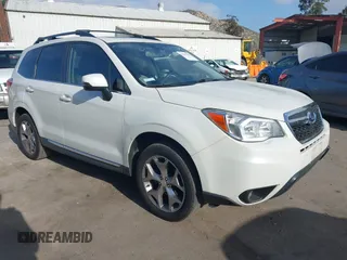 2016 Subaru Forester Touring z VIN JF2SJAXC7GH565287, wystawiony jako IAAI lot #41947083 z przebiegiem 126 563 mil mil oraz . Historia ofert i sprzedaży dostępna na DreamBid. Obrazek 1.