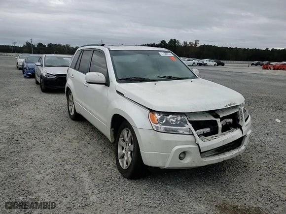 2011 Suzuki Grand Vitara Limited with VIN JS3TE0D73B4100502, listed as a Copart auction lot 77589524 with 195,572 mi miles and Salvage Title. Bid and sale history available at carsss.com. Image 10.
