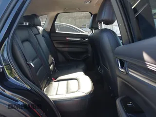 2021 Mazda CX-5 Grand Touring with VIN JM3KFADM1M0406098, listed as a IAAI auction lot 41654735 with 33,050 mi miles. Bid and sale history available at carsss.com. Image 8.
