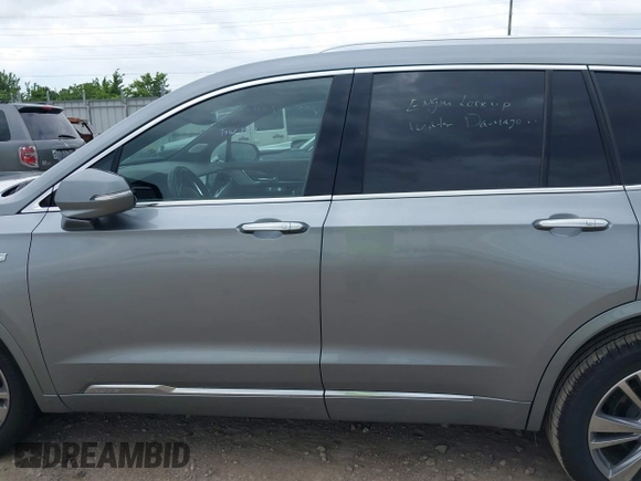 2025 Cadillac XT6 FWD Premium Luxury with VIN 1GYKPCRS0SZ119055, listed as a IAAI auction lot 42574001 with 17,137 mi miles and . Bid and sale history available at DreamBid. Image 14.