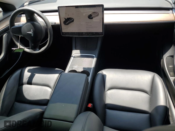 2023 Tesla Model 3 with VIN 5YJ3E1EA4PF614129, listed as a Copart auction lot 62019385 with 23,218 mi miles and Salvage title. Bid and sale history available at DreamBid. Image 8.