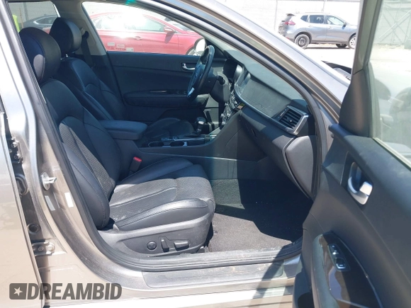 2017 Kia Optima EX with VIN 5XXGU4L38HG142560, listed as a IAAI auction lot 42167391 with 61,015 mi miles and . Bid and sale history available at DreamBid. Image 5.