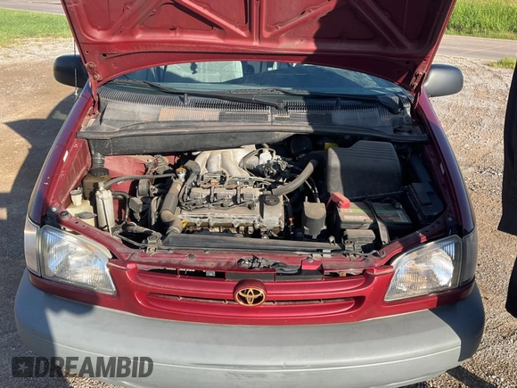 1999 Toyota Sienna LE with VIN 4T3ZF13C5XU141279, listed as a Copart auction lot 64366315 with 218,223 mi miles and Clean title. Bid and sale history available at DreamBid. Image 7.