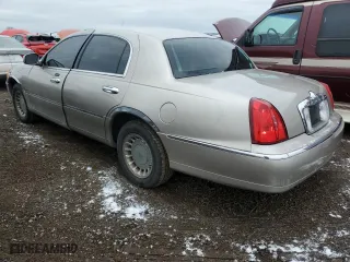 2001 Lincoln Town Car Executive with VIN 1LNHM81W31Y733358, listed as a Copart auction lot 85582644 with 88,418 mi miles and Salvage Title. Bid and sale history available at carsss.com. Image 2.