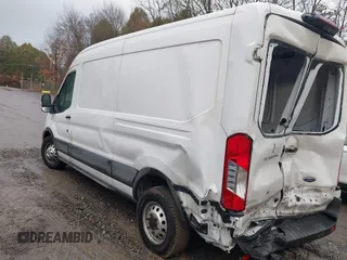 2021 Ford Transit Cargo with VIN 1FTBR2C82MKA29523, listed as a IAAI auction lot 41069336 with 195,397 mi miles and . Bid and sale history available at DreamBid. Image 3.