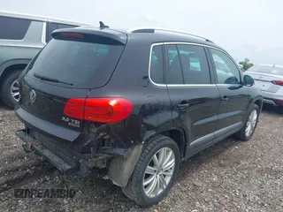 2013 Volkswagen Tiguan S with VIN WVGBV3AX7DW611410, listed as a IAAI auction lot 42549561 with 115,855 mi miles and . Bid and sale history available at DreamBid. Image 4.