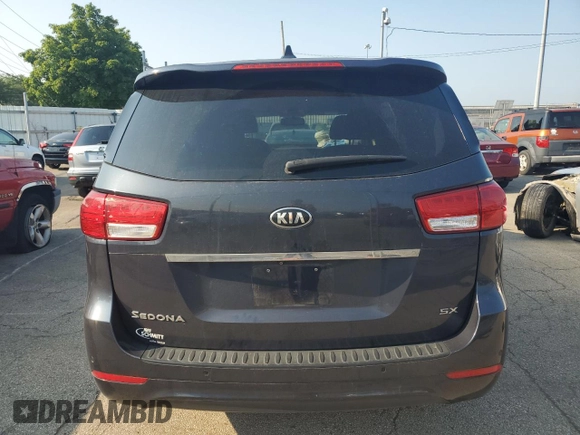 2015 Kia Sedona SX with VIN KNDMC5C10F6047335, listed as a Copart auction lot 66235414 with 154,460 mi miles and Salvage Title. Bid and sale history available at DreamBid. Image 6.