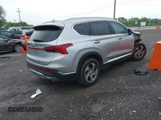2022 Hyundai Santa Fe SEL z VIN 5NMS34AJ2NH476238, wystawiony jako IAAI lot #42119497 z przebiegiem 23 883 mil mil oraz . Historia ofert i sprzedaży dostępna na DreamBid. Obrazek 4.