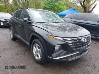 2022 Hyundai Tucson SEL z VIN 5NMJBCAE9NH015906, wystawiony jako IAAI lot #42169136 z przebiegiem 28 009 mil mil oraz . Historia ofert i sprzedaży dostępna na DreamBid. Obrazek 1.