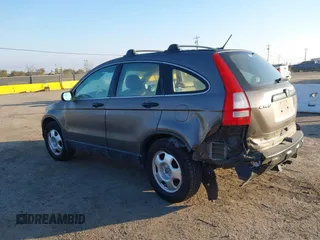 2009 Honda CR-V LX with VIN 5J6RE48389L011915, listed as a IAAI auction lot 41301796 with 214,807 mi miles. Bid and sale history available at carsss.com. Image 6.