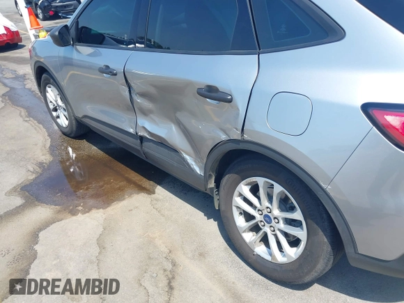 2021 Ford Escape S with VIN 1FMCU0F63MUA50558, listed as a IAAI auction lot 42072684 with 19,241 mi miles and . Bid and sale history available at DreamBid. Image 6.