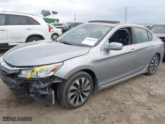 2017 Honda Accord Hybrid Touring with VIN JHMCR6F75HC016374, listed as a IAAI auction lot 41468778 with 180,618 mi miles. Bid and sale history available at carsss.com. Image 2.