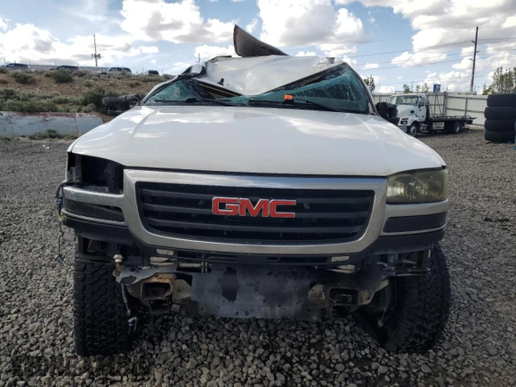 2003 GMC Sierra 2500HD SLE z VIN 1GTHK29U83E116147, wystawiony jako Copart lot #57079385 z przebiegiem Nie podano mil oraz Szkoda całkowita • Salvage title. Historia ofert i sprzedaży dostępna na DreamBid. Obrazek 5.