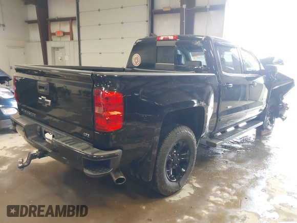 2015 Chevrolet Silverado 1500 LTZ with VIN 3GCUKSEJ0FG365663, listed as a IAAI auction lot 41553902 with 123,266 mi miles. Bid and sale history available at carsss.com. Image 4.