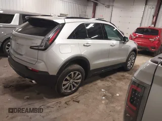 2021 Cadillac XT4 FWD Sport with VIN 1GYFZER40MF061378, listed as a IAAI auction lot 41744219 with 33,750 mi miles and . Bid and sale history available at DreamBid. Image 4.