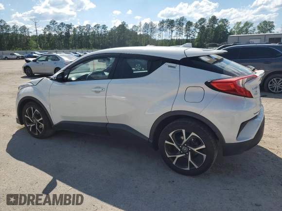 2018 Toyota C-HR XLE z VIN NMTKHMBX4JR031512, wystawiony jako Copart lot #55096715 z przebiegiem 100 522 mil mil oraz Szkoda całkowita • Salvage title. Historia ofert i sprzedaży dostępna na DreamBid. Obrazek 2.