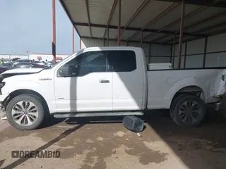 2015 Ford F-150 XL with VIN 1FTEX1CP0FKE84653, listed as a IAAI auction lot 41794451 with 156,552 mi miles. Bid and sale history available at carsss.com. Image 14.